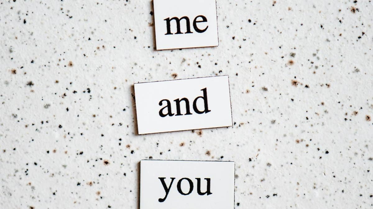 Simple words 'me and you' on speckled surface with minimalist typography. via Pexels