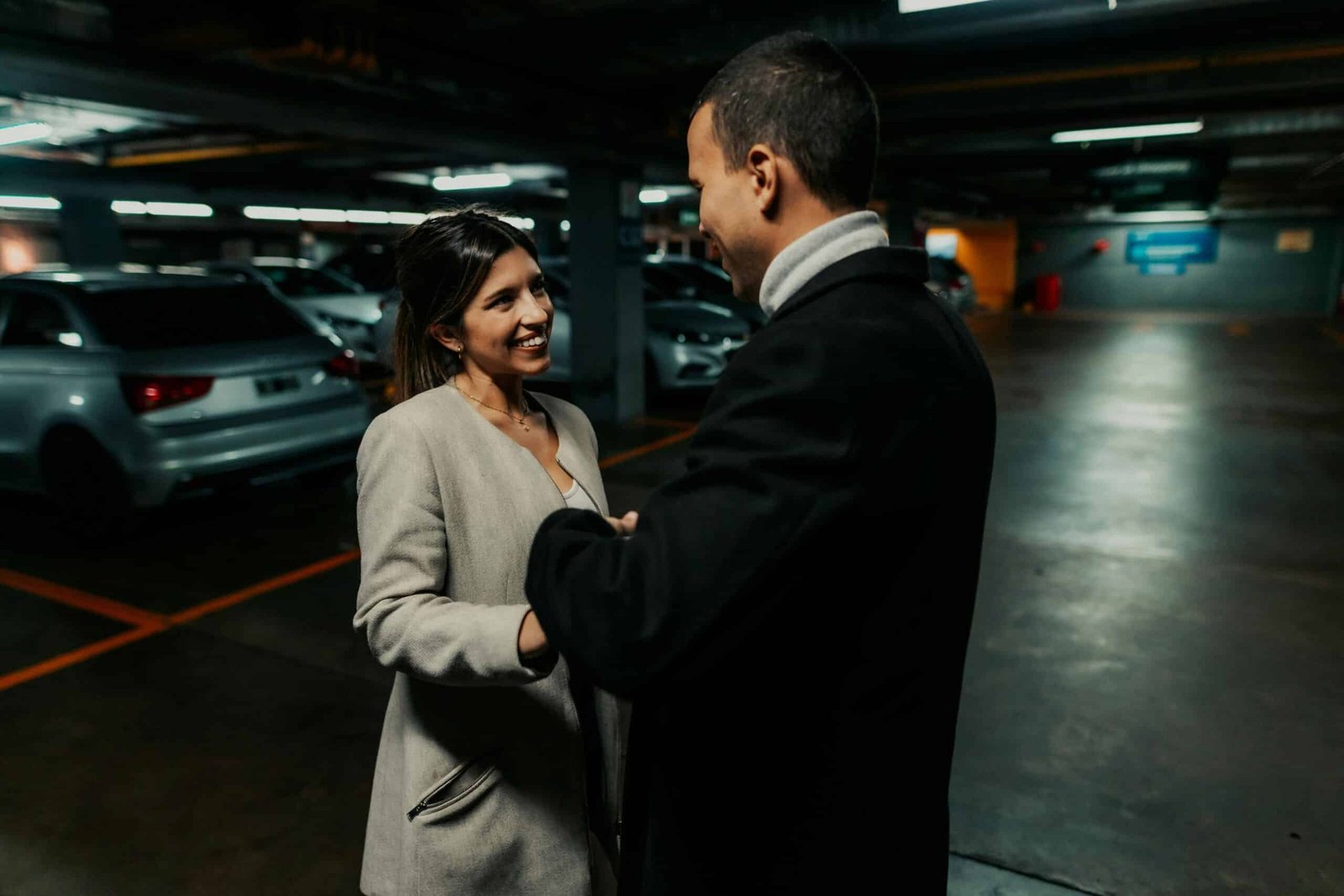 Couple sharing a moment in underground parking