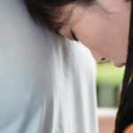 A close-up of a couple embracing, conveying comfort and support. via Pexels