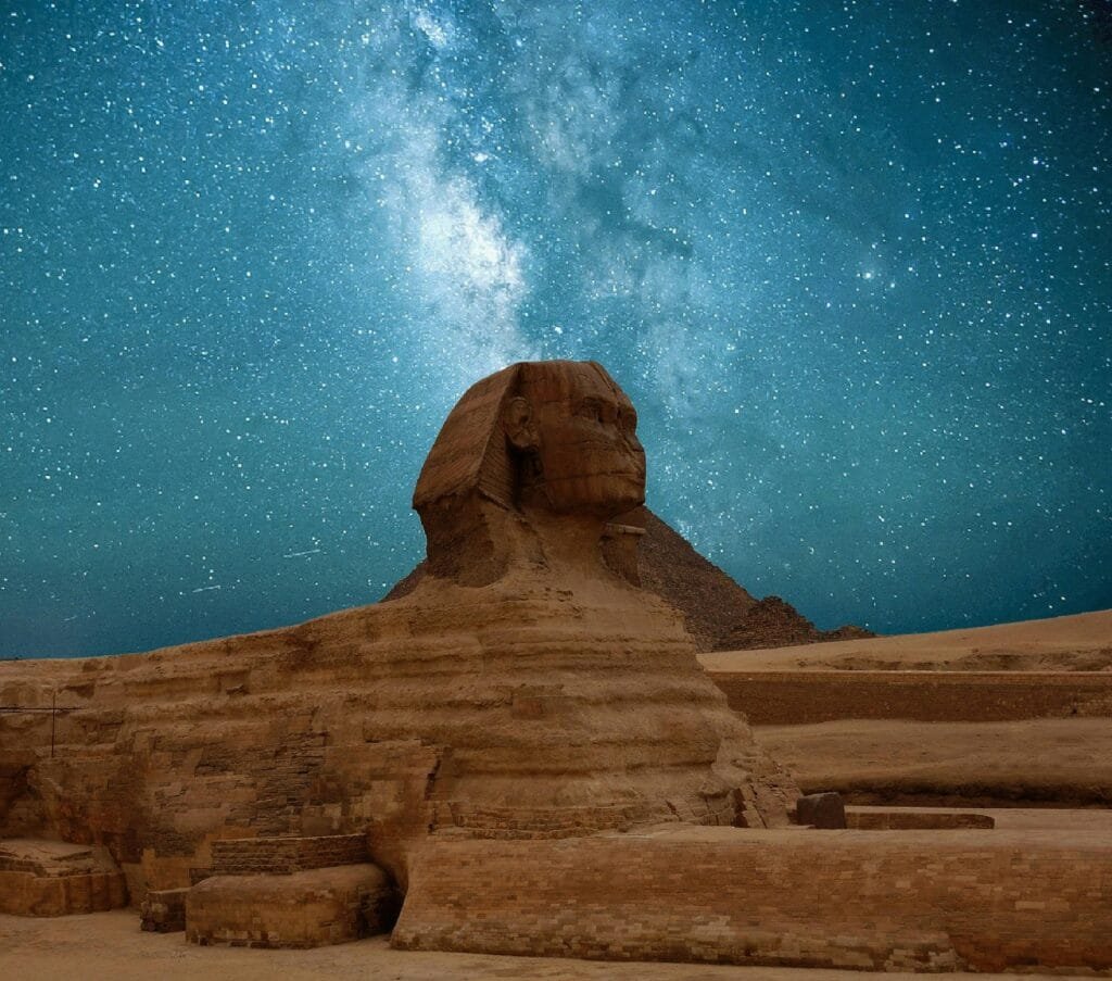 Great sphinx of giza under blue starry sky