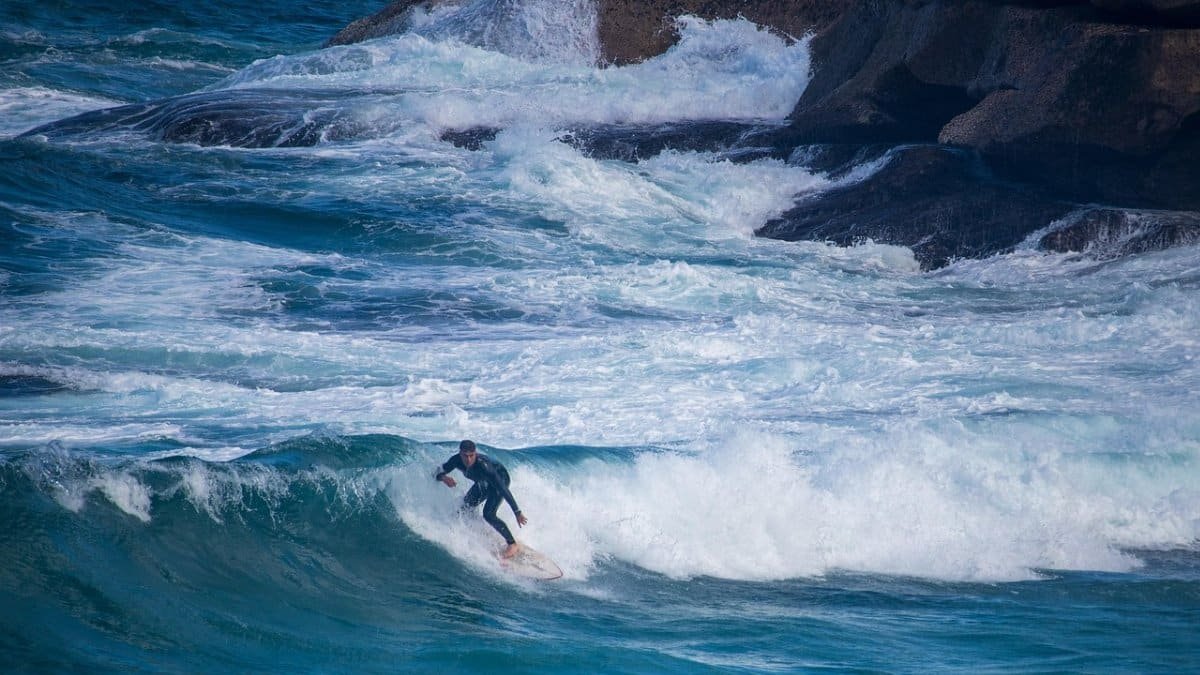 surfing,  waves,  sport,  surfer,  man,  action,  watersports,  riding,  wave riding,  ocean,  surf,  nature,  seascape,  motion,  cliffs,  crashing