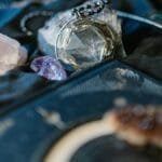 Delicate display of various gemstones and crystals, perfect for spiritual rituals.