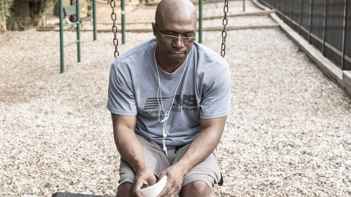 caribbean man,  generation x,  depressed,  man on a swing,  suicidal,  man in a playground,  black man,  generation x,  generation x,  generation x,  generation x,  generation x,  suicidal,  black man