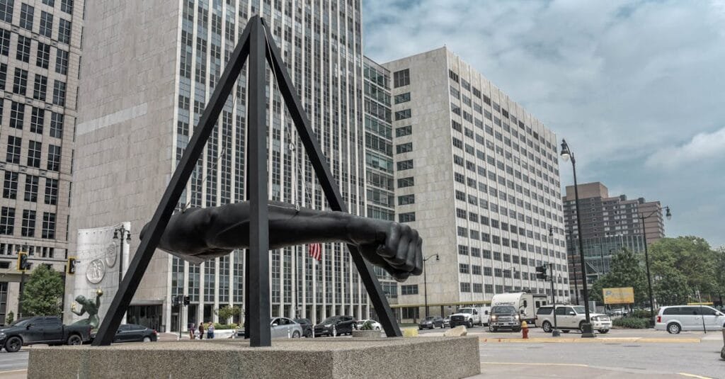Urban scene featuring the iconic Joe Louis Fist in downtown Detroit via Pexels