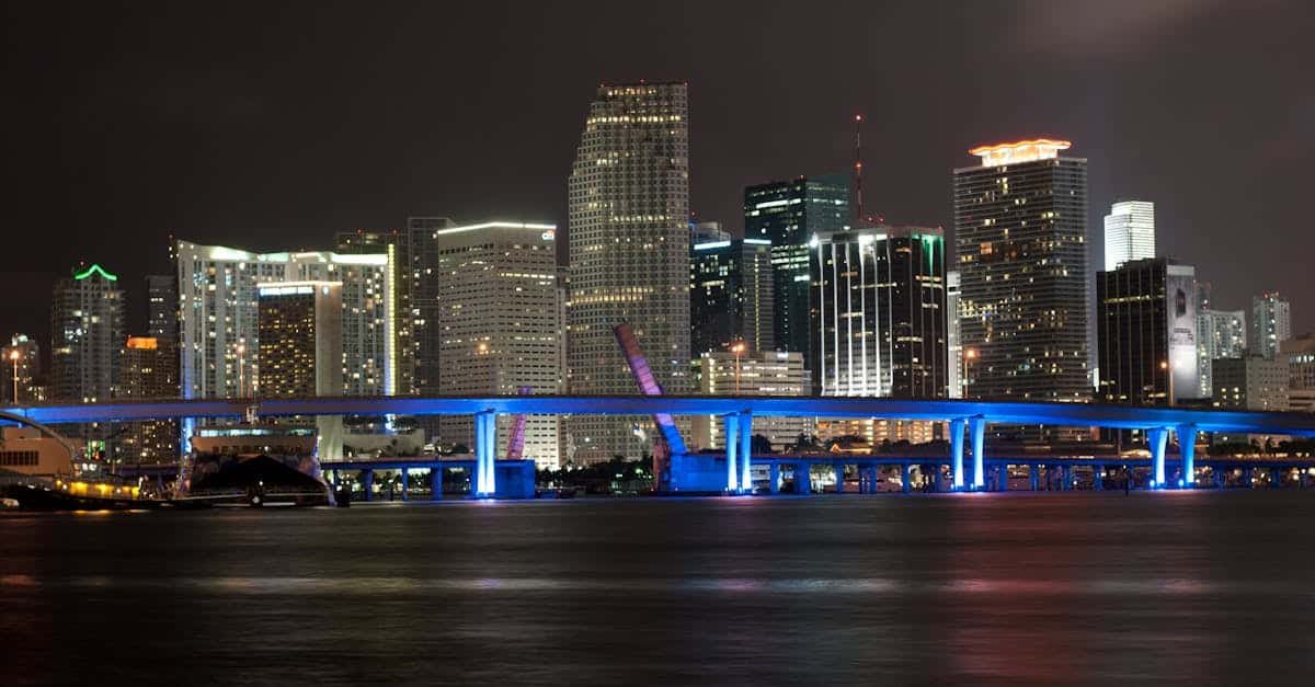 Stunning nighttime view of the illuminated Miami skyline and bridge via Pexels