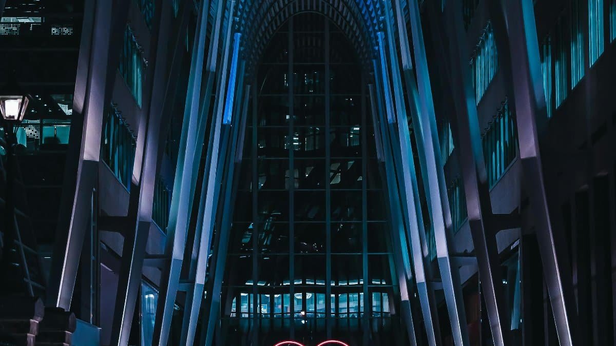 Captivating view of a modern interior in Toronto with a neon heart installation and blue lighting.