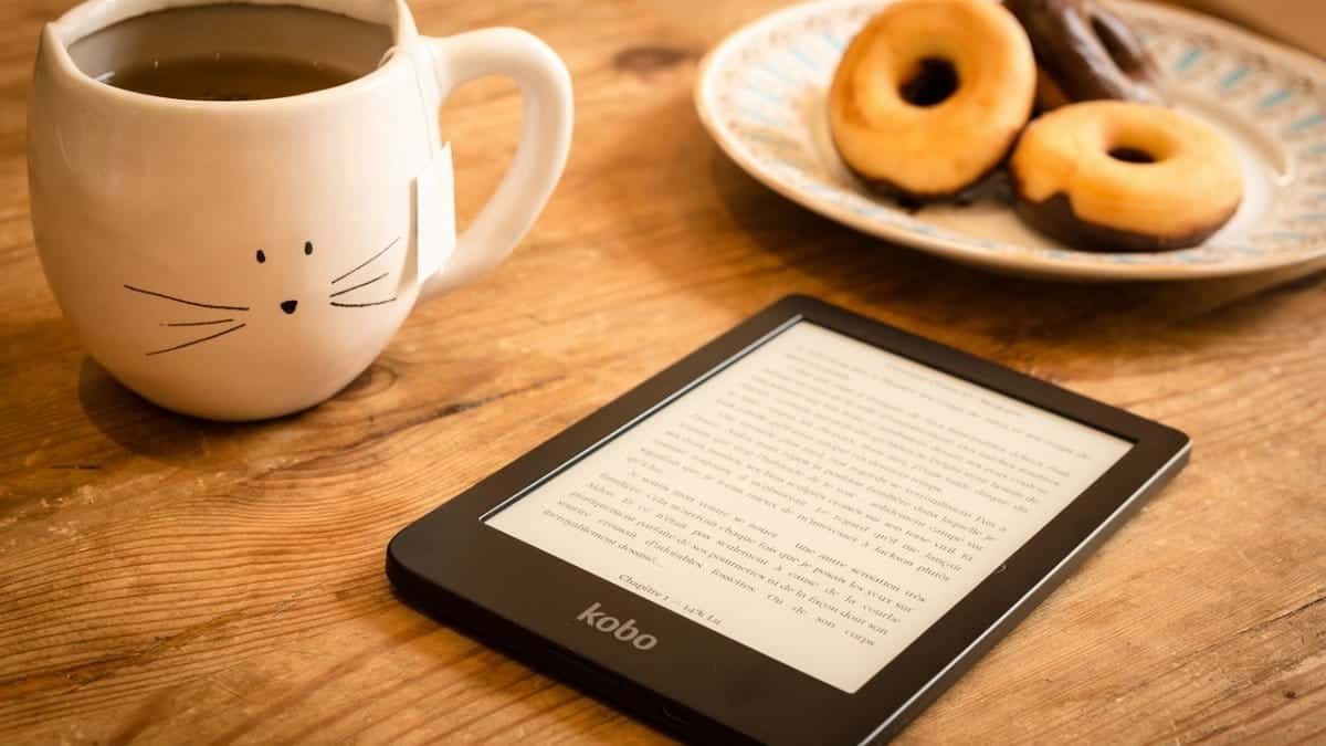 reading, refreshments, e-reader, doughnuts, donuts, dessert, tea, book, e-book, snack, reading, reading, tea, tea, book, book, book, book, book