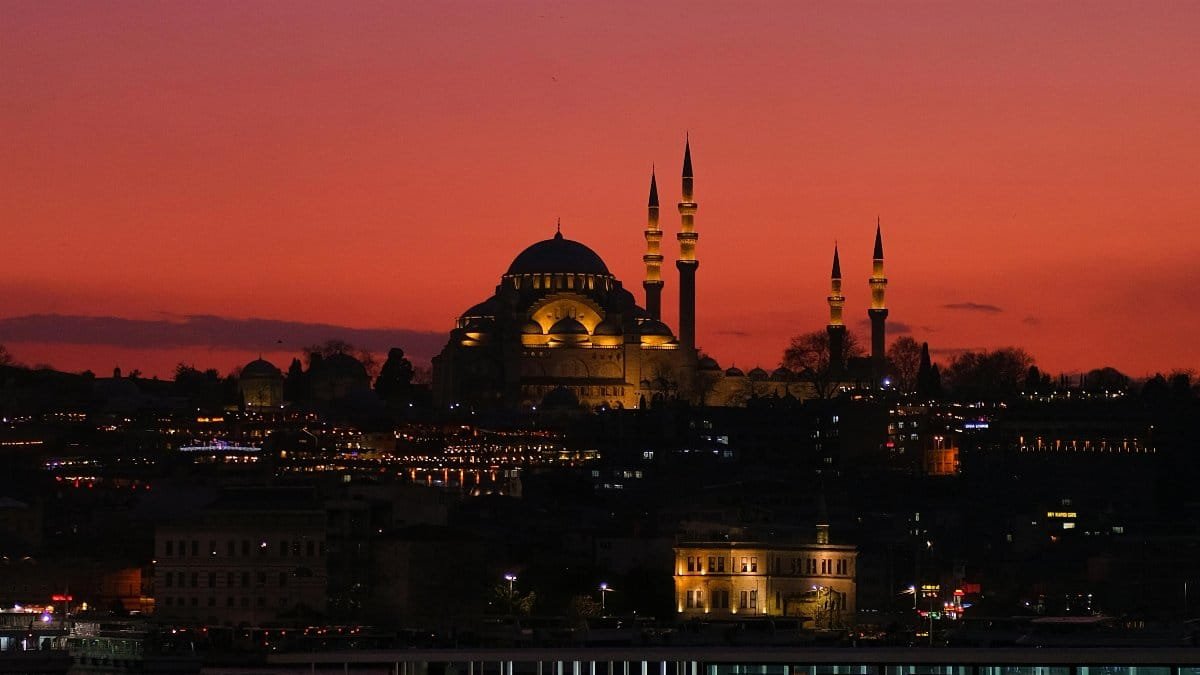 Scenic view of Istanbul cityscape with a mosque and ferry during sunset, capturing urban beauty. via Pexels