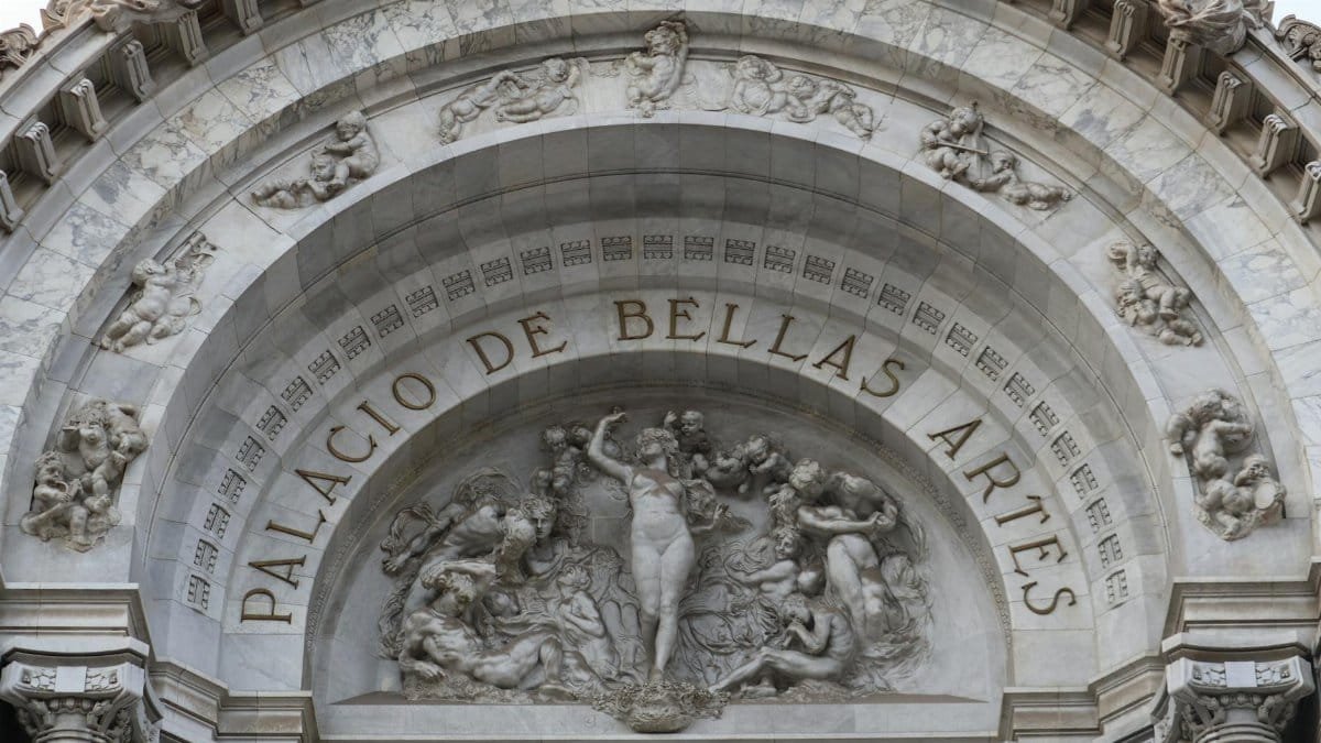 Close-up view of the detailed facade of Palacio de Bellas Artes in Mexico City.