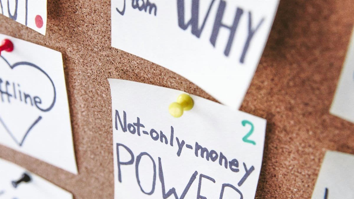 Close-up of motivational sticky notes with messages on a cork board. via Pexels