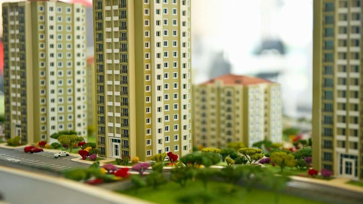Close-up image of a modern residential building model, showcasing urban architecture.