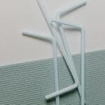 A modern close-up of plastic straws artistically arranged on a textured surface, ideal for design concepts.