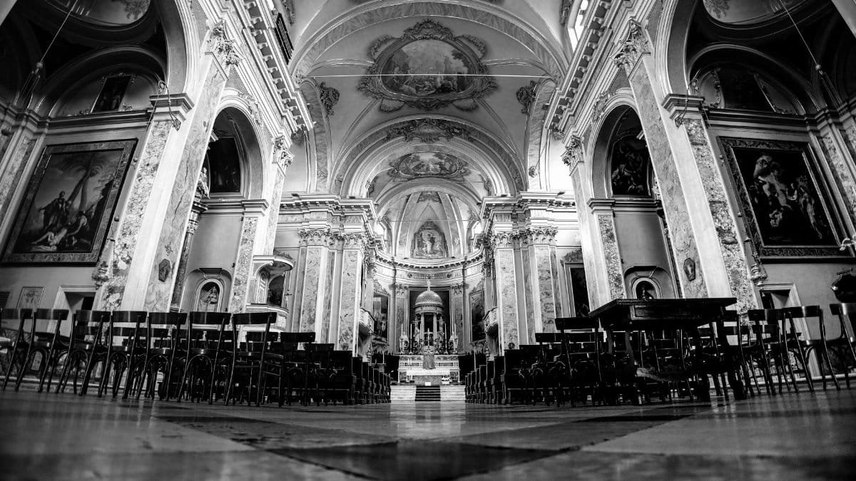 Explore the intricate architecture of a historic Italian church in black and white.