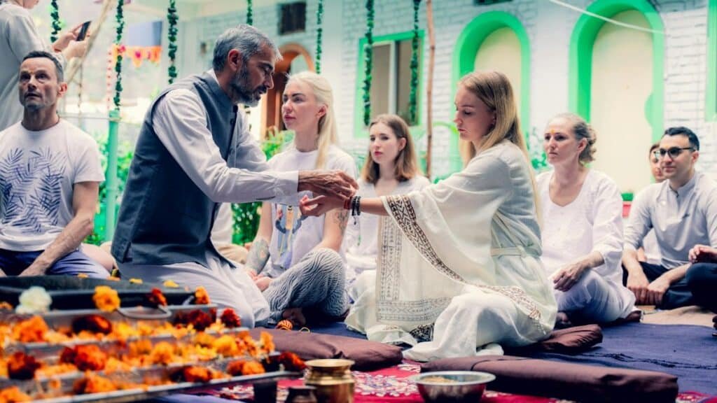 People participate in a spiritual yoga ceremony in Rishikesh, India.