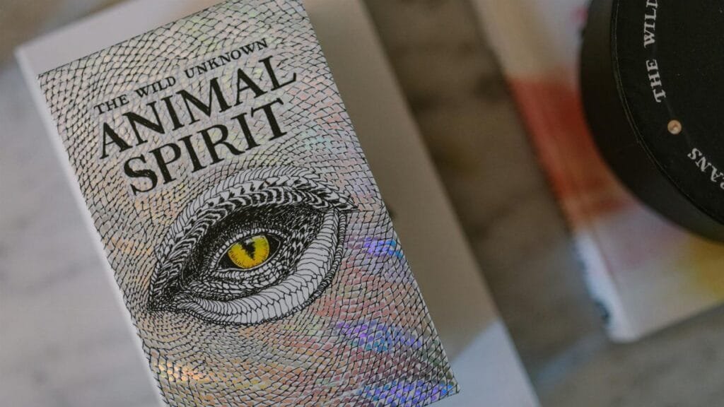A close-up shot of The Wild Unknown Animal Spirit Deck showcasing its mystical cover.