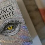 A close-up shot of The Wild Unknown Animal Spirit Deck showcasing its mystical cover.