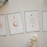 Top view of tarot cards and crystals, perfect for spiritual and mystical themes.