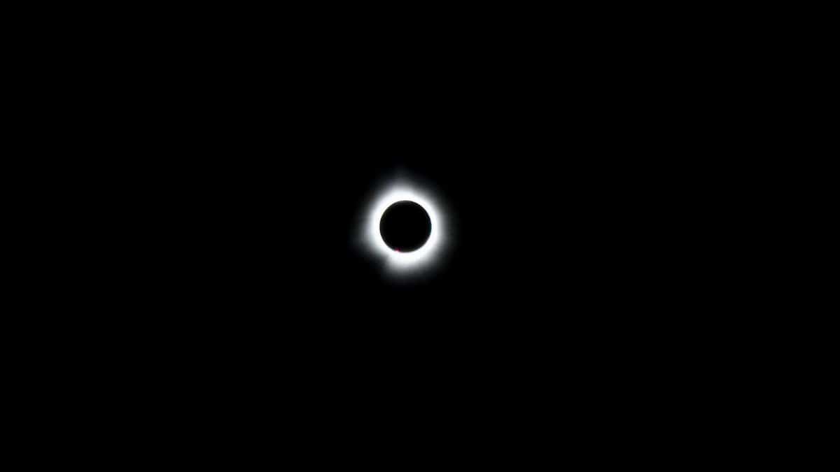Total solar eclipse showcasing the sun's corona in Magog, Quebec, Canada.