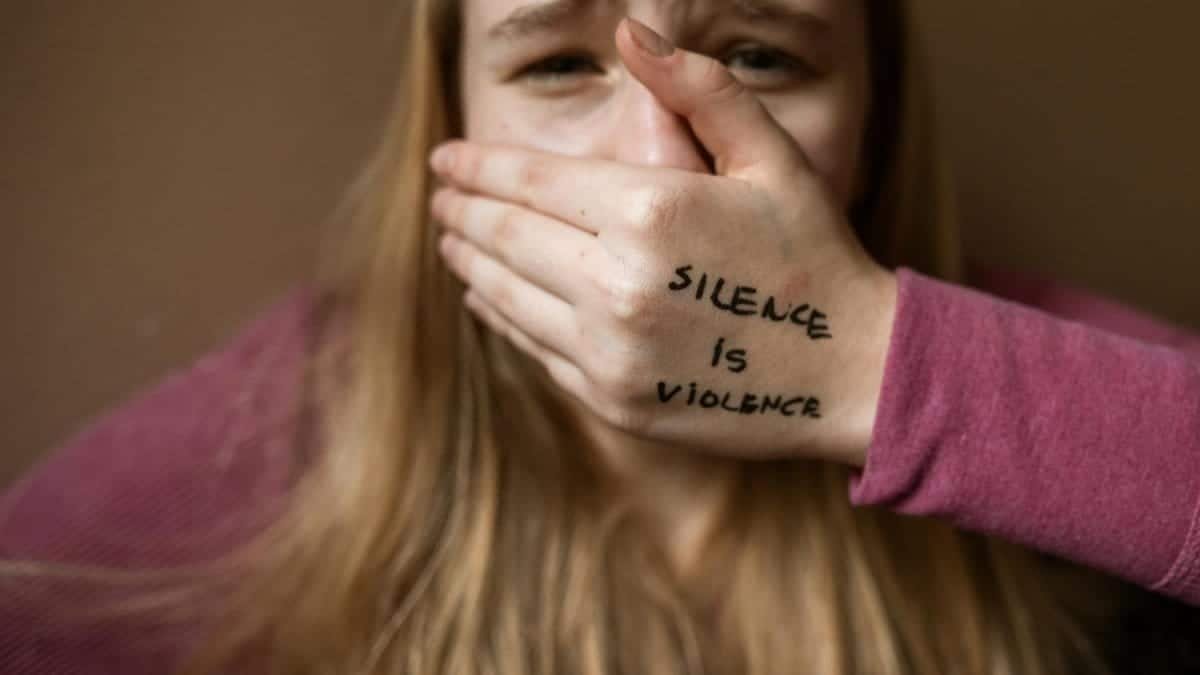 Powerful image highlighting the message 'Silence is Violence' to raise awareness on social issues.
