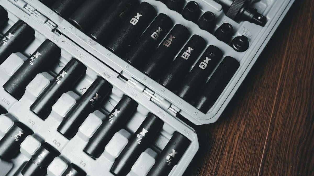 A detailed close-up of a socket tool set neatly arranged in a hard case, ideal for mechanical work.