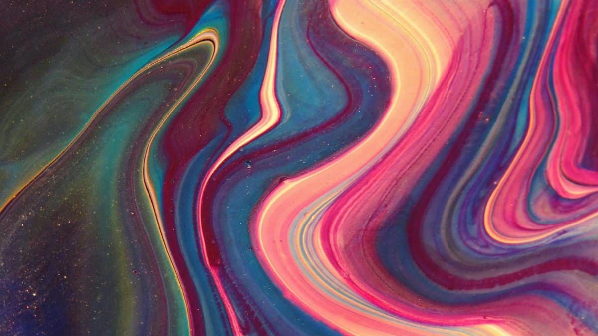 Colorful abstract acrylic painting with swirling patterns and vibrant colors.