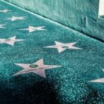 View of Hollywood Walk of Fame with stars on the sidewalk in Los Angeles, California.