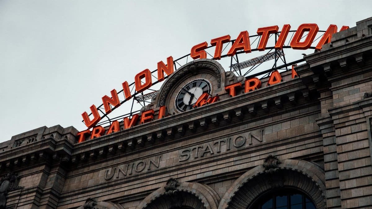 Iconic Union Station facade with clock and signage in Denver, Colorado, USA.