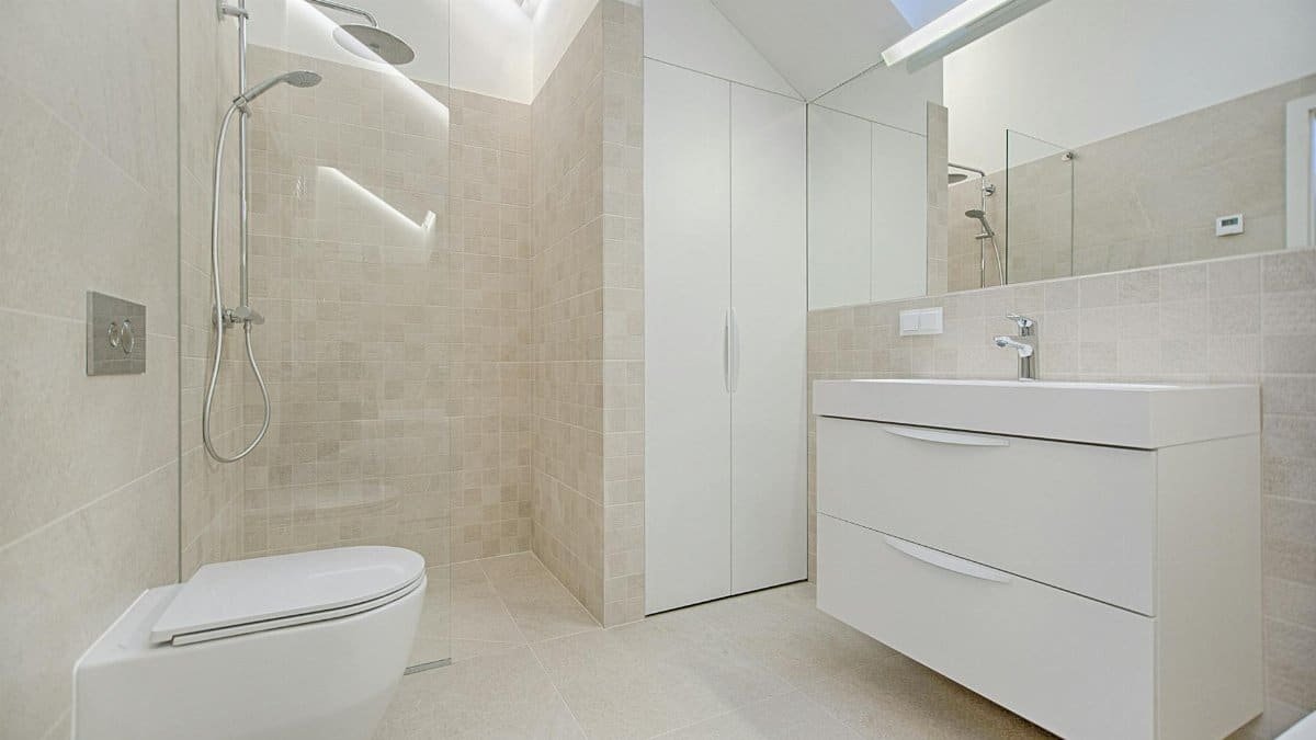 Bright and luxurious bathroom with contemporary fixtures and sleek design.