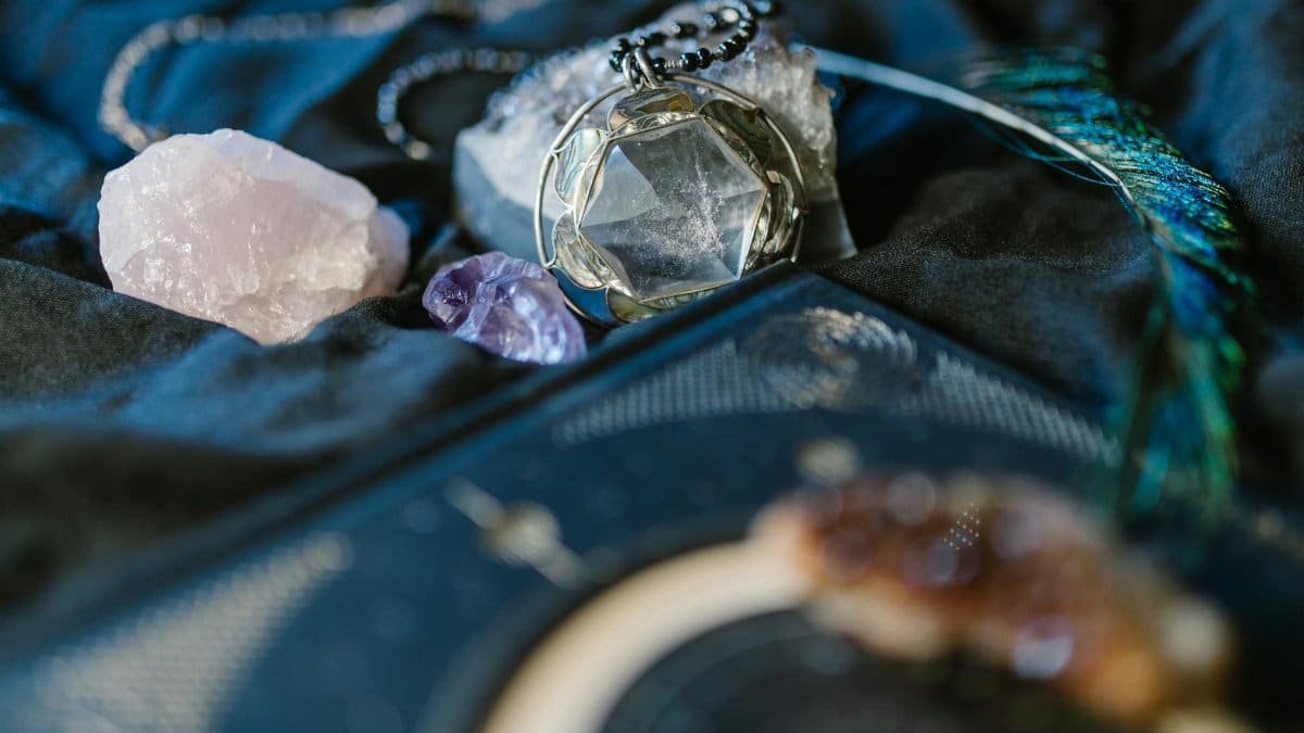 Delicate display of various gemstones and crystals, perfect for spiritual rituals.