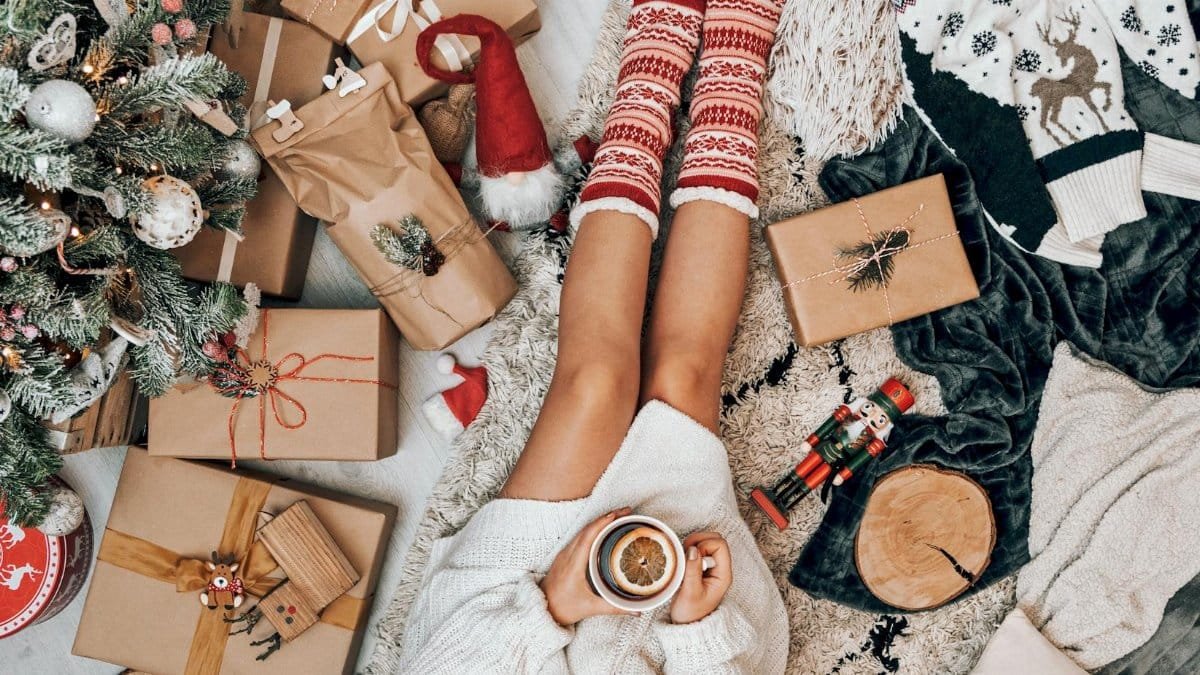 Enjoy a relaxing Christmas morning with festive decor, gifts, and a cozy mug of tea.