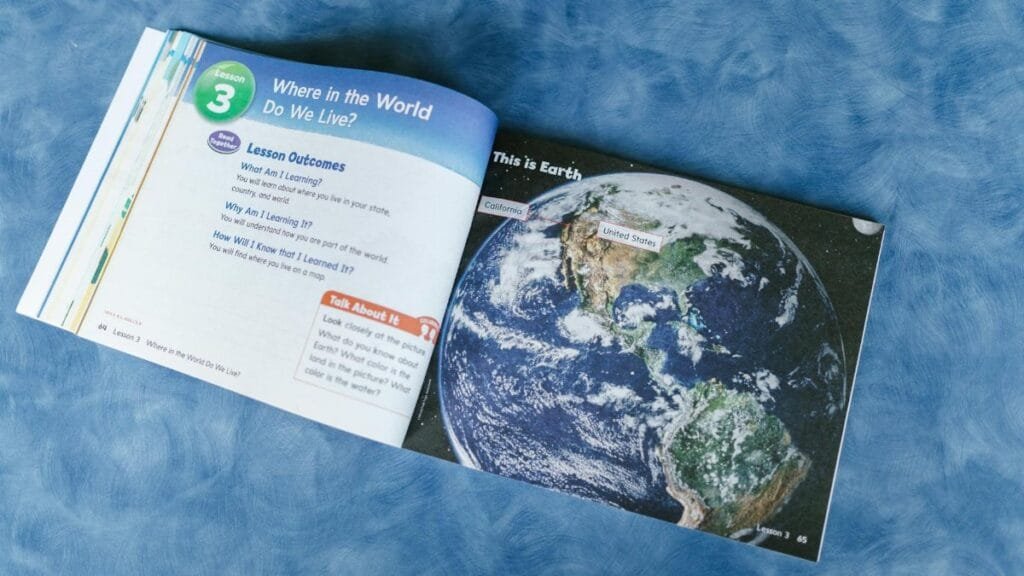 An open educational book displaying a world map and lesson outcomes about global locations.