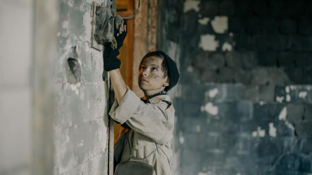 Young explorer in abandoned building, symbolizing survival in a post-apocalyptic world.