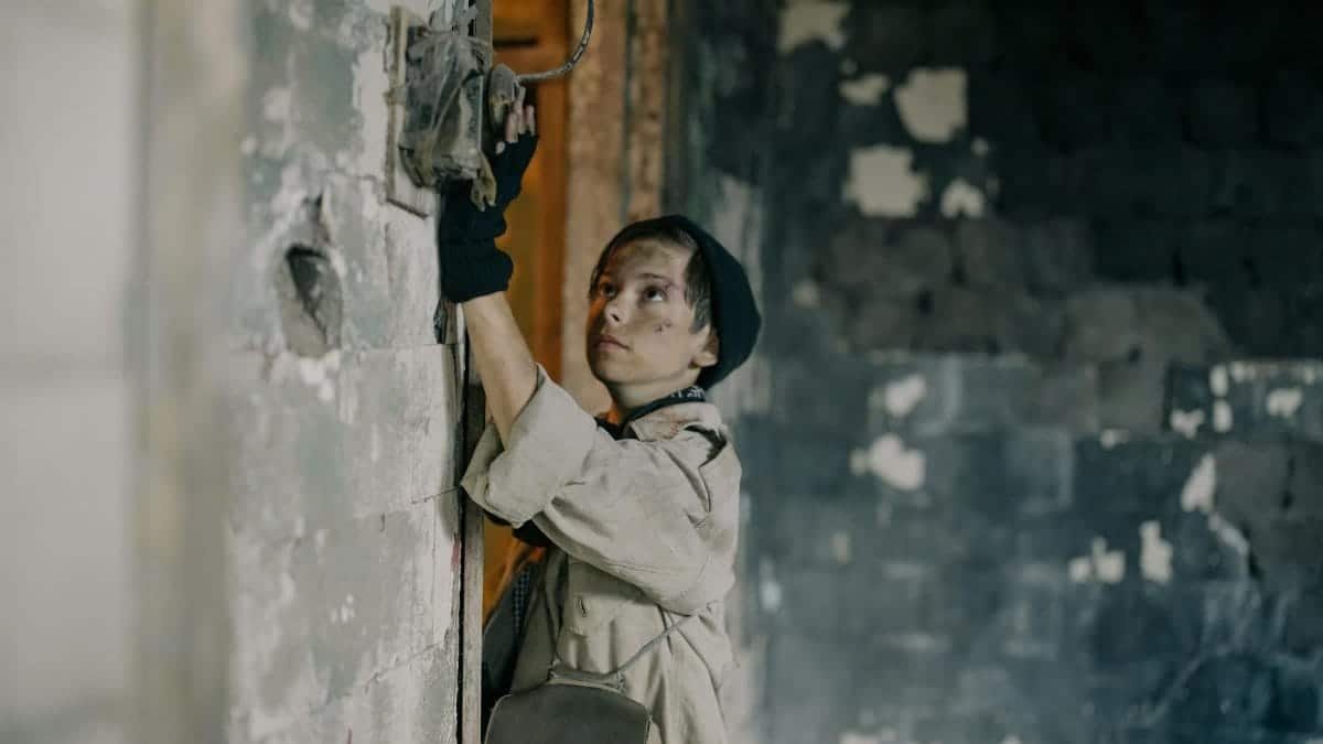 Young explorer in abandoned building, symbolizing survival in a post-apocalyptic world.