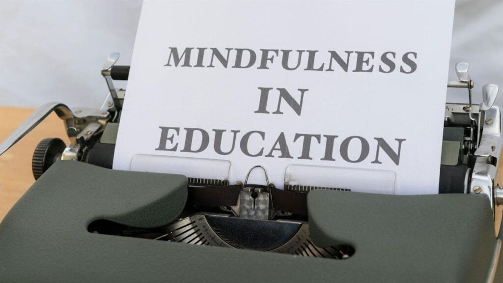 Close-up of a typewriter with paper showing 'Mindfulness in Education'.