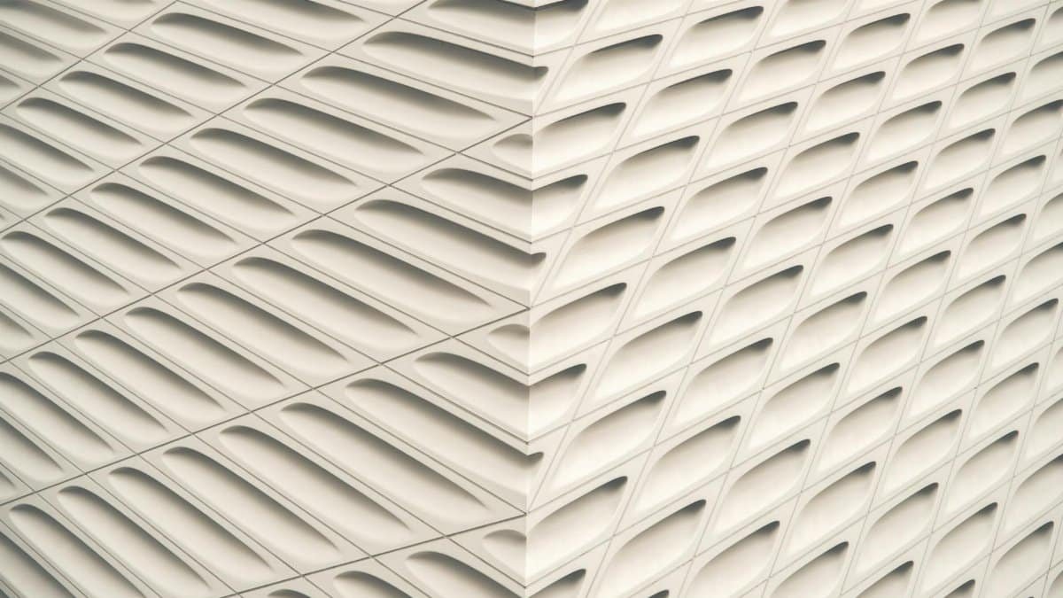 Symmetrical architectural facade with a modern geometric pattern, ideal for design inspiration.