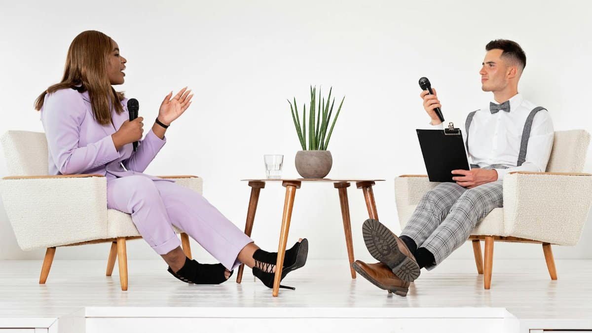 Business interview with diverse professionals discussing topics indoors