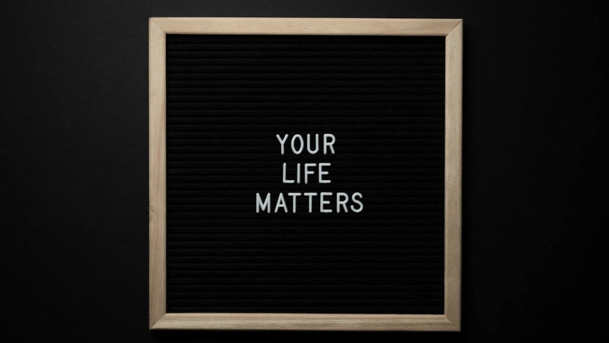 A chalkboard with the motivational message 'Your Life Matters' in white letters.
