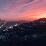Capture of the vibrant Los Angeles skyline under a dramatic sunset sky via Pexels