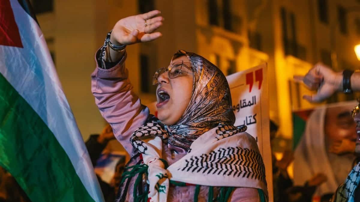 A passionate protestor rallies for Palestinian rights in Rabat, Morocco, during a public demonstration.