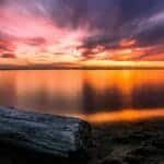Beautiful sunset at Richmond beach with colorful sky and reflections over calm waters.