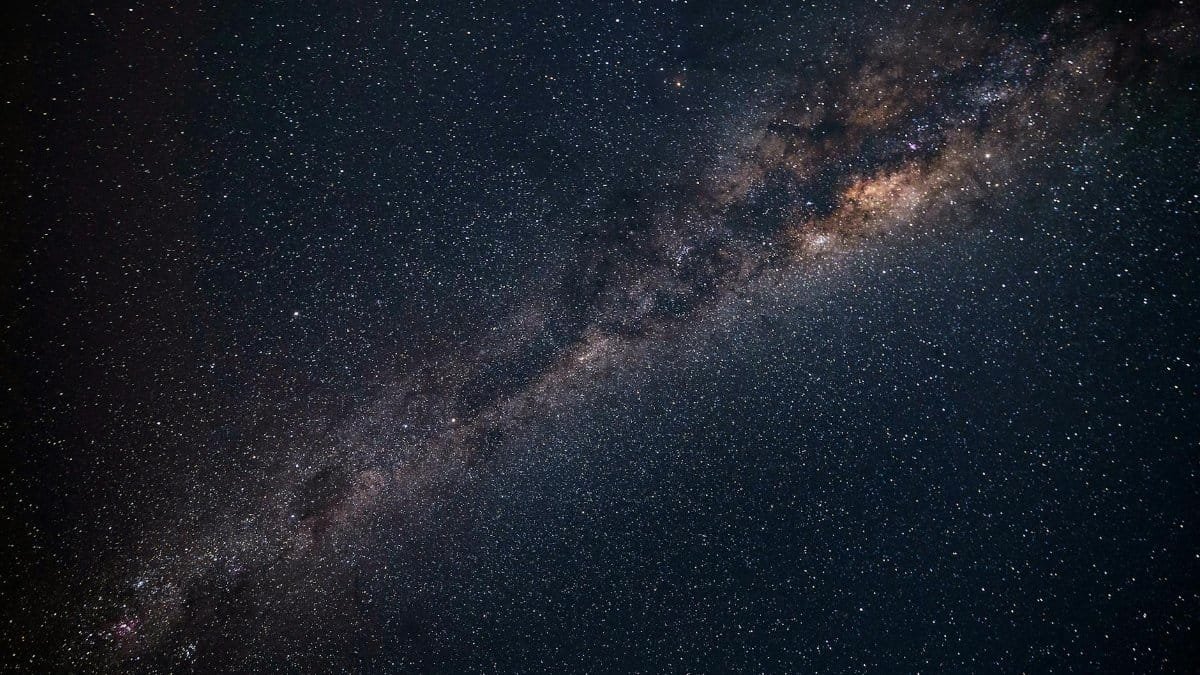 A breathtaking view of the Milky Way galaxy sparkling in the night sky over Punta Ballena, Uruguay.