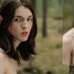 Portrait of a mystical elf character with long hair, reflecting in a forest mirror.