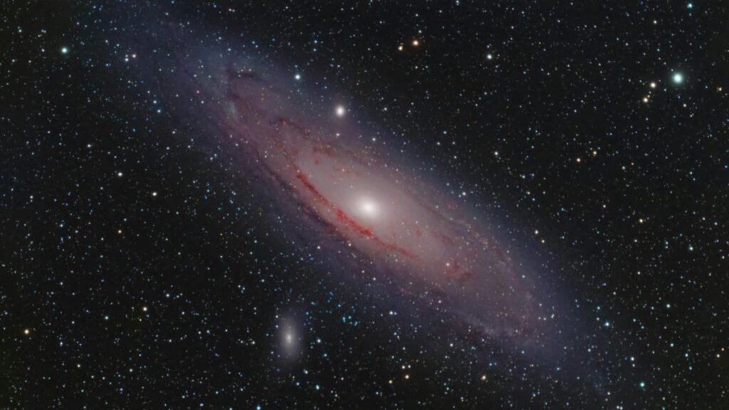 A captivating view of the Andromeda Galaxy surrounded by stars in the vast cosmos.