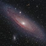 A captivating view of the Andromeda Galaxy surrounded by stars in the vast cosmos.