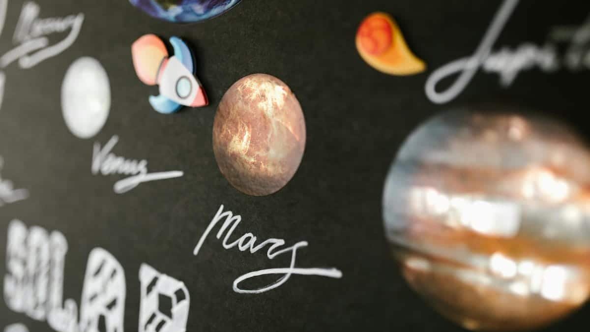 Creative depiction of the solar system planets for school project on a dark background.