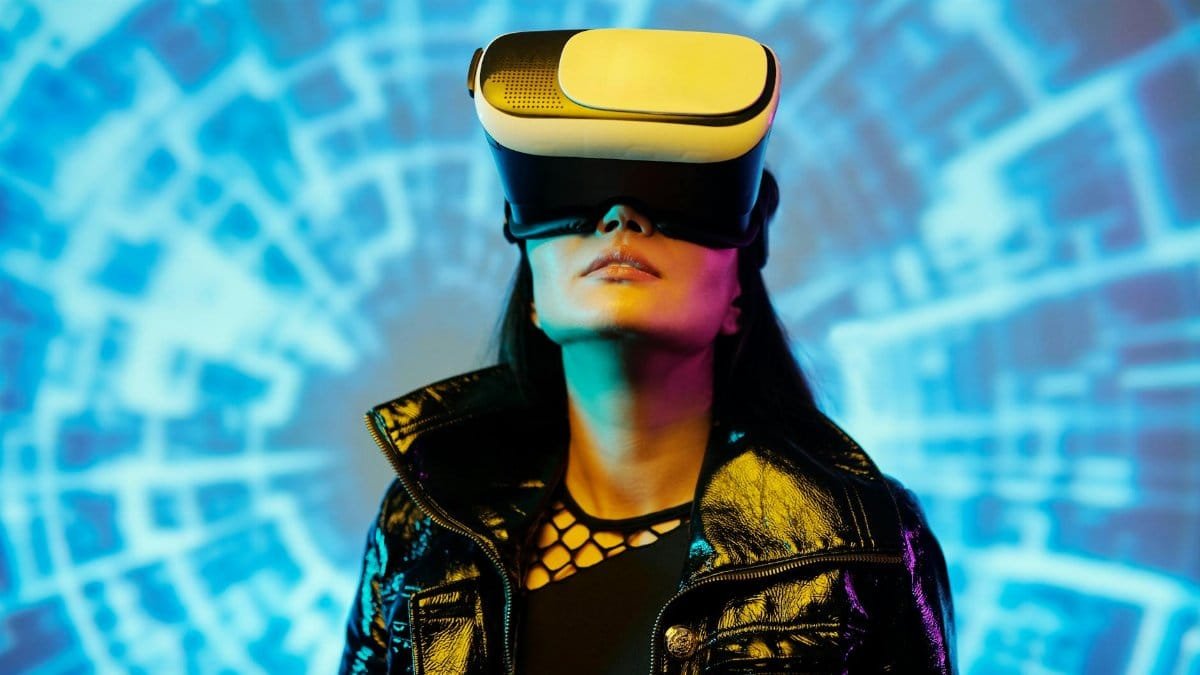 A woman using a VR headset immersed in a digital virtual reality environment.