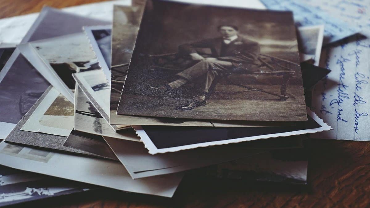 A nostalgic collection of vintage photos and handwritten letters, depicting memories and stories from the past.
