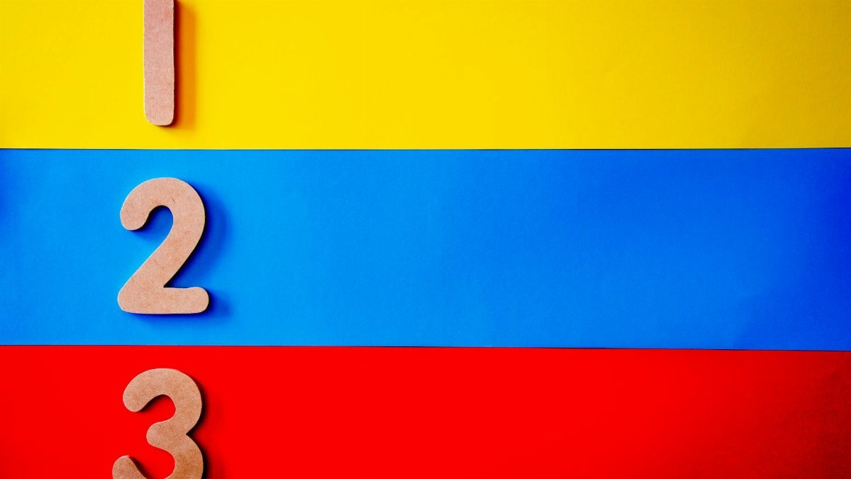 Vibrant image of numbers one, two, and three against a primary color background.
