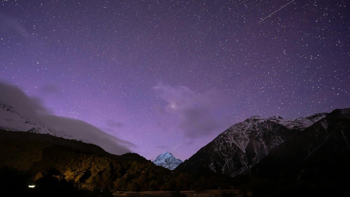 Starry night over Aoraki / Mount Cook in New Zealand captures the galactic wonder and serene mountainscape.
