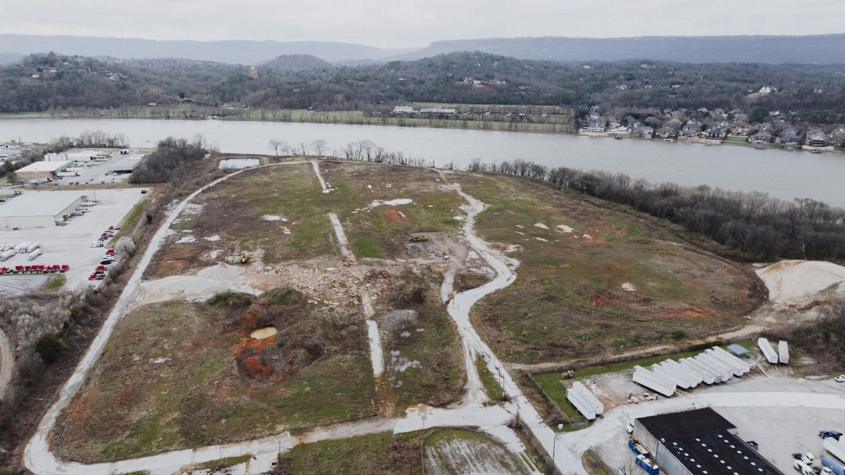 Aerial photograph of Chattanooga, Tennessee showcasing a riverside landscape on a cloudy day.